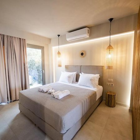 Theros Suites Dhiminio Экстерьер фото