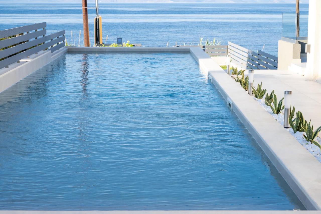 Theros Suites Dhiminio Экстерьер фото