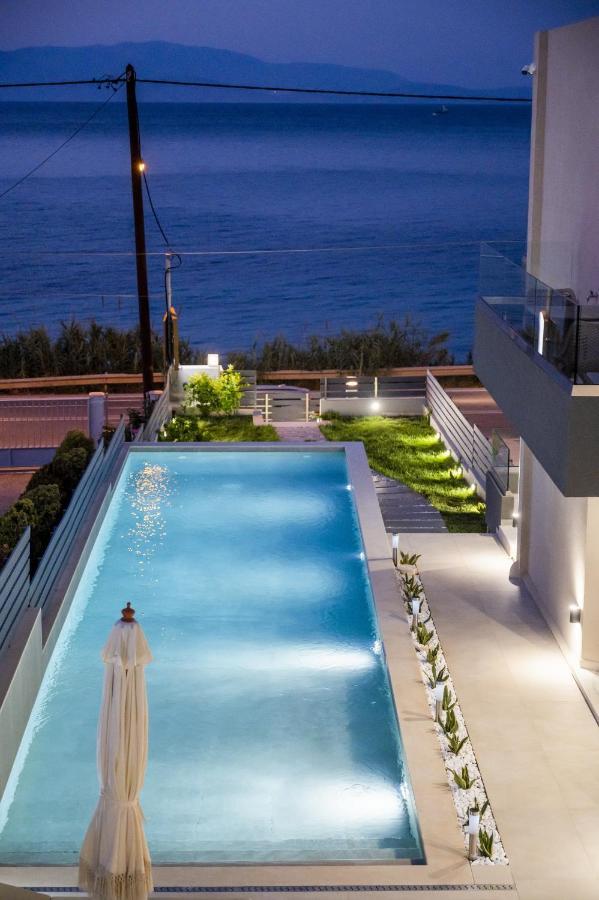 Theros Suites Dhiminio Экстерьер фото