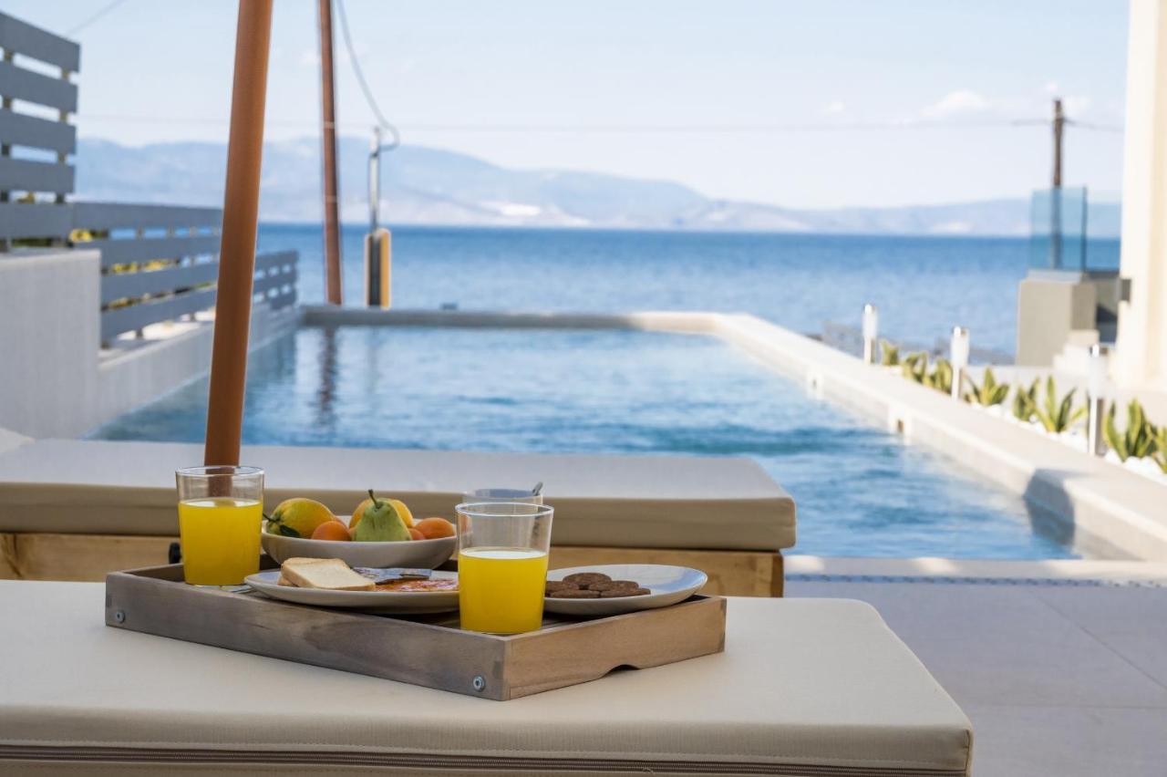 Theros Suites Dhiminio Экстерьер фото