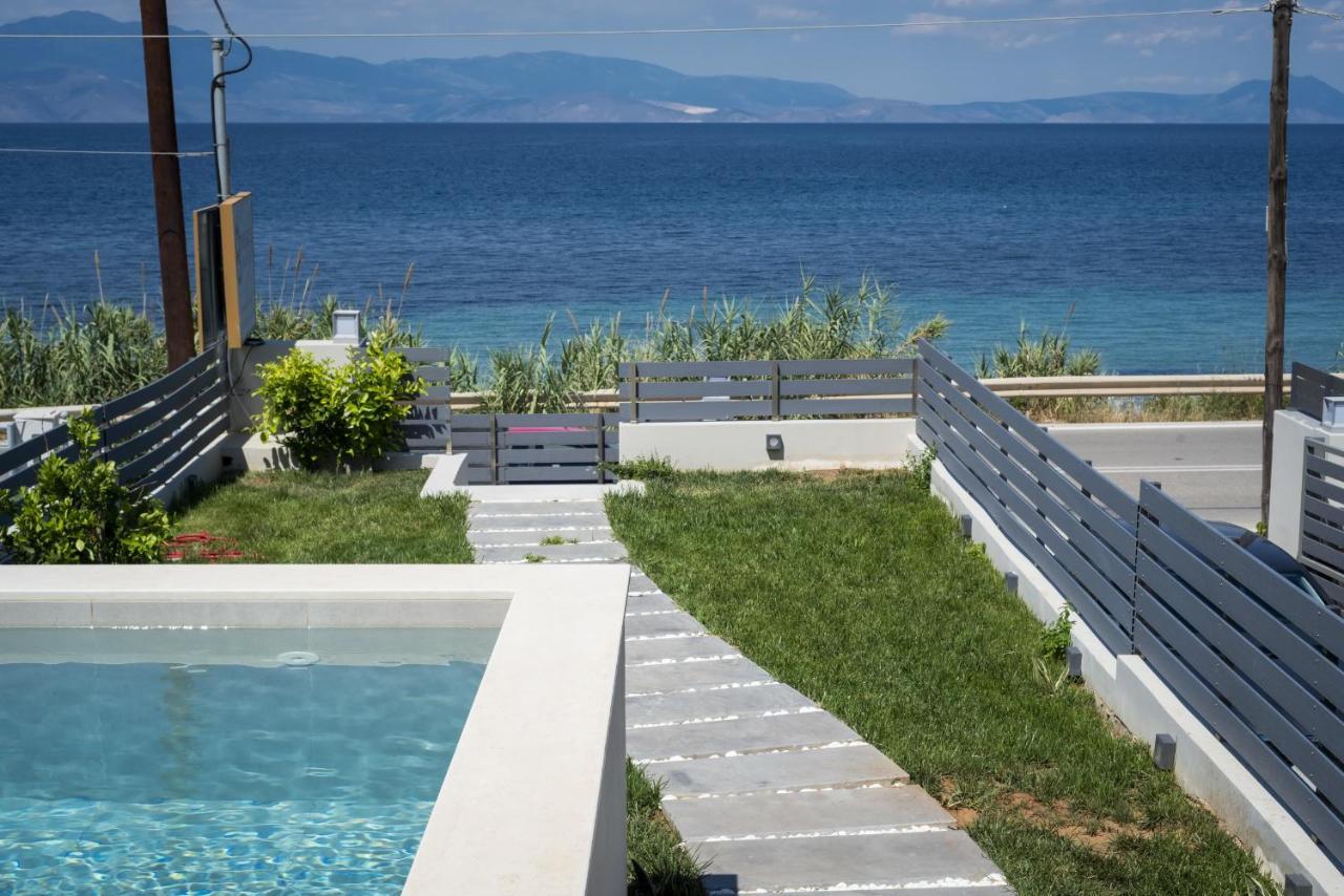 Theros Suites Dhiminio Экстерьер фото