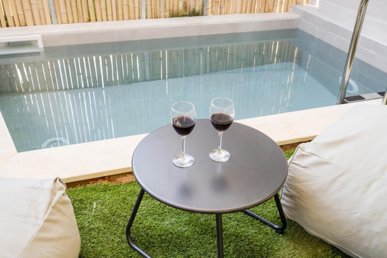 Theros Suites Dhiminio Экстерьер фото