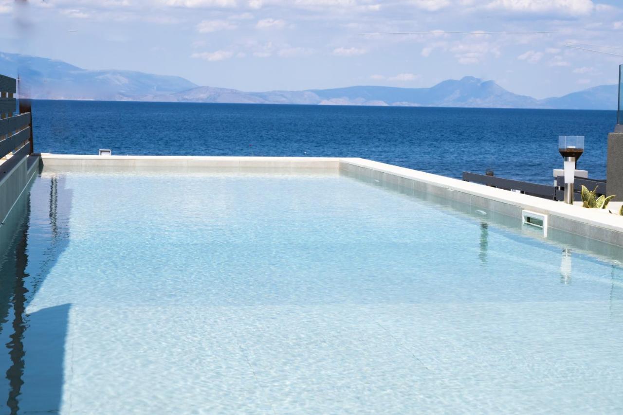 Theros Suites Dhiminio Экстерьер фото