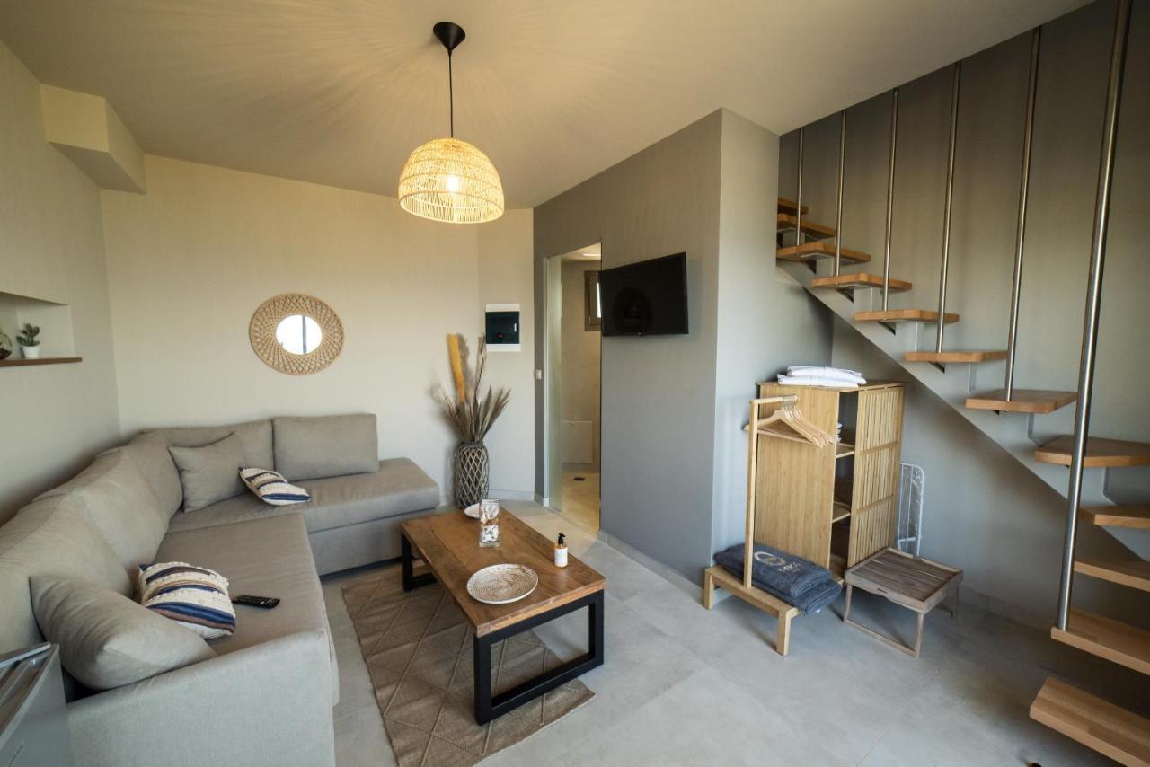 Theros Suites Dhiminio Экстерьер фото