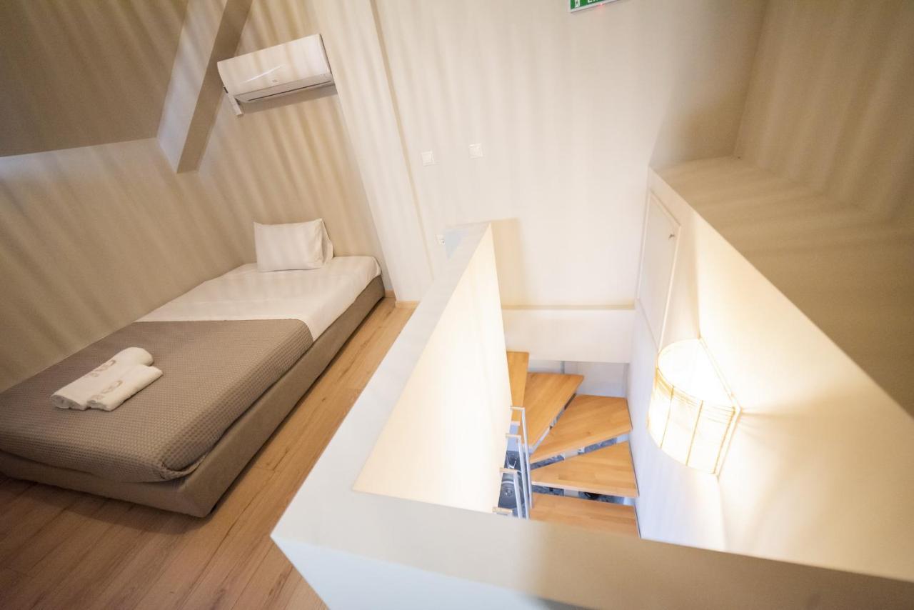 Theros Suites Dhiminio Экстерьер фото