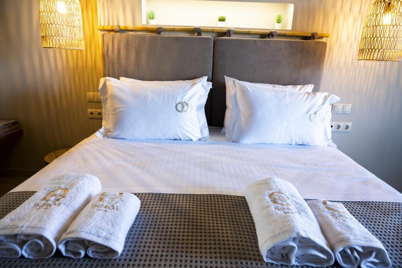 Theros Suites Dhiminio Экстерьер фото