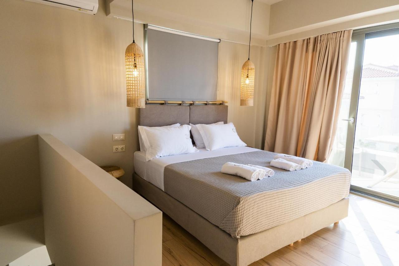 Theros Suites Dhiminio Экстерьер фото