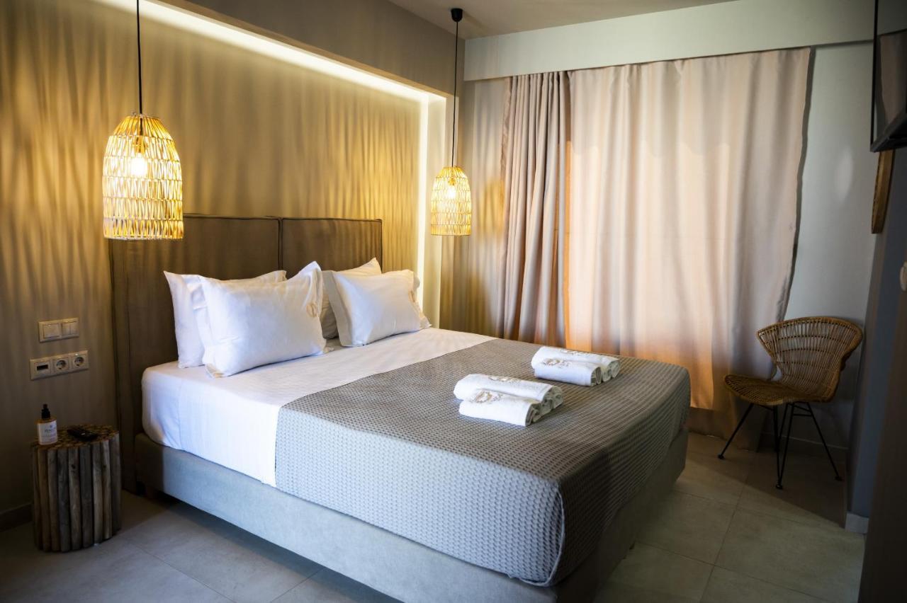 Theros Suites Dhiminio Экстерьер фото