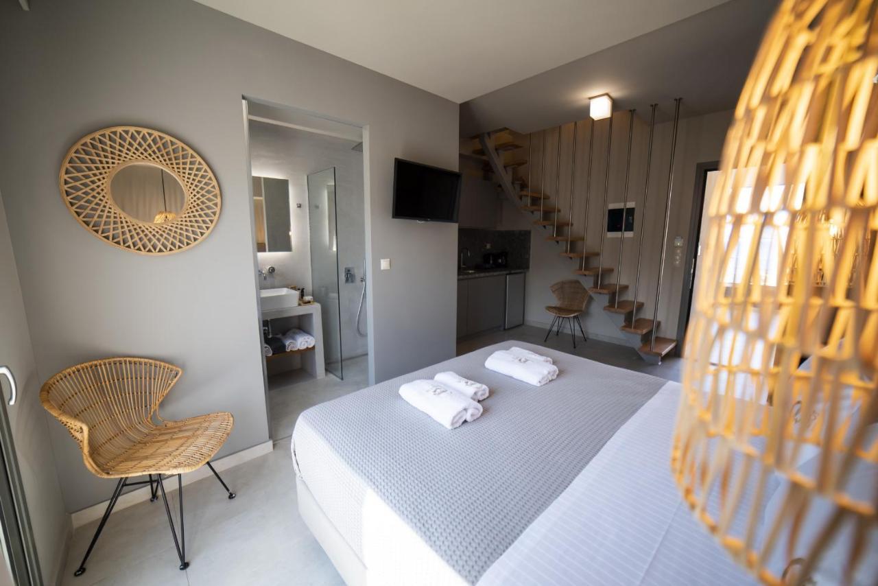 Theros Suites Dhiminio Экстерьер фото